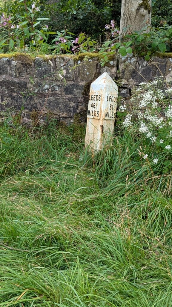 Milepost on the canal. Liverpool 81 miles, Leeds 46.5 miles